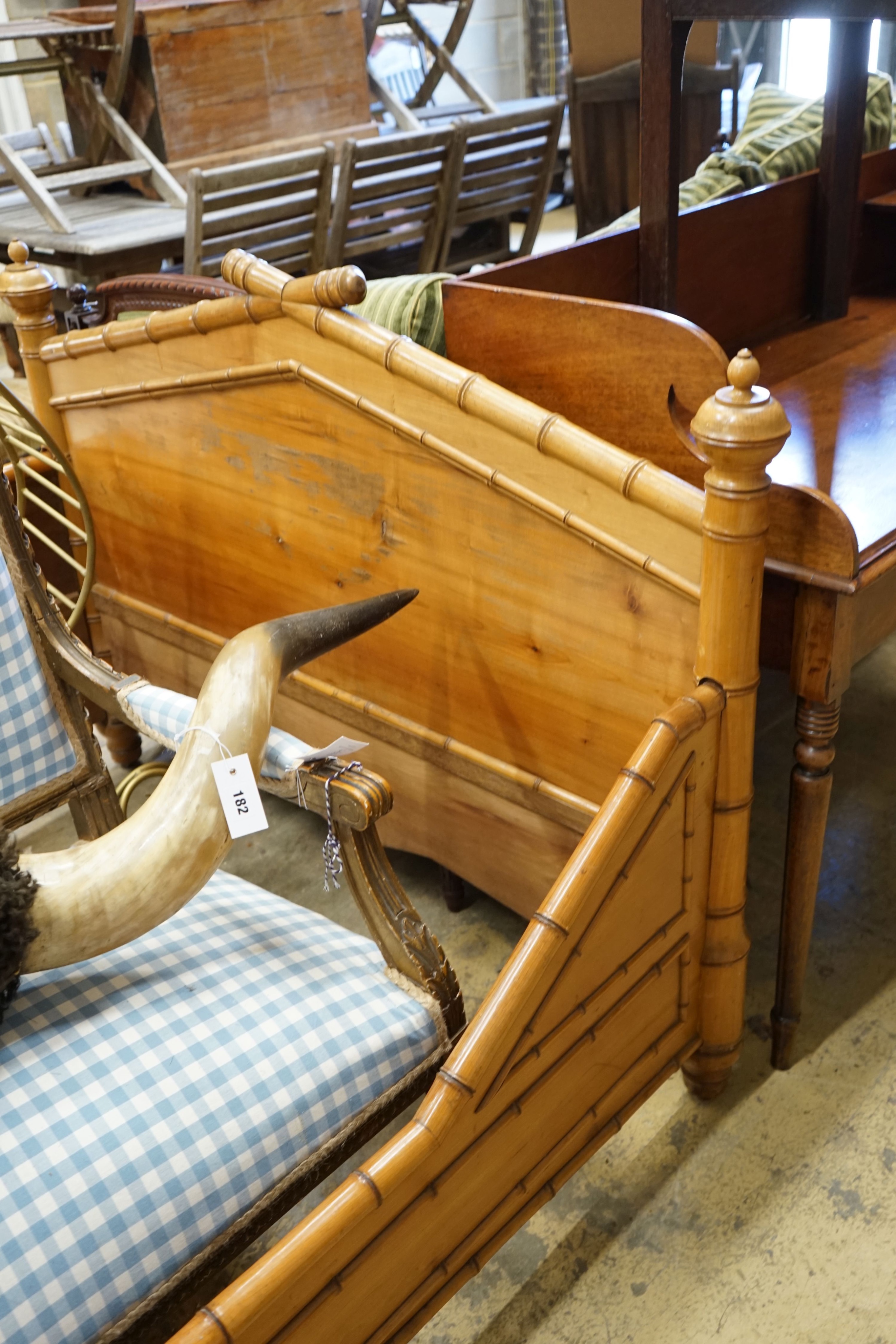 A 19th century French cherry faux bamboo bedframe, width 200cm depth 128cm height 117cm